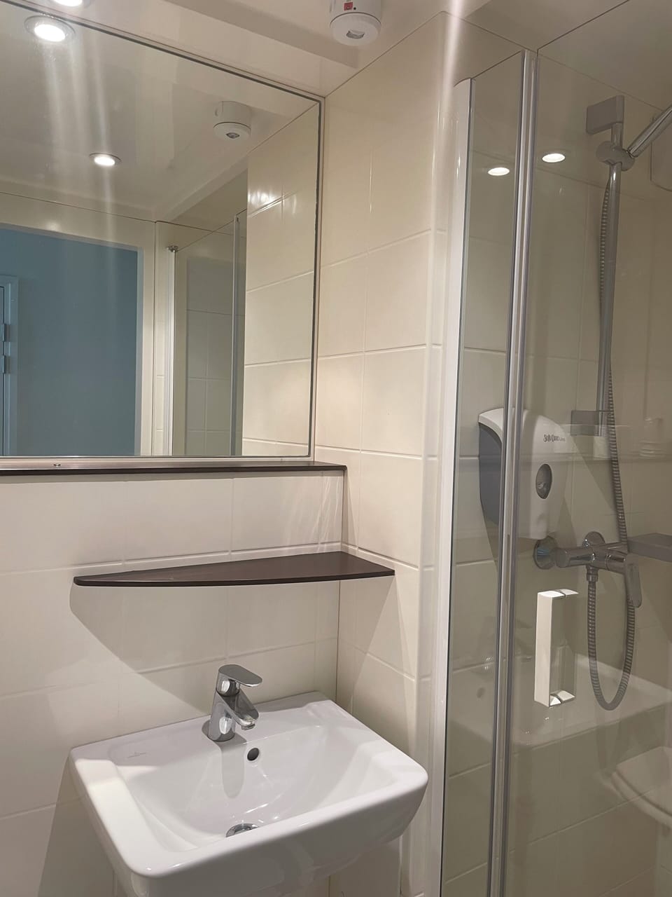 Shower, eco-friendly toiletries, towels, soap