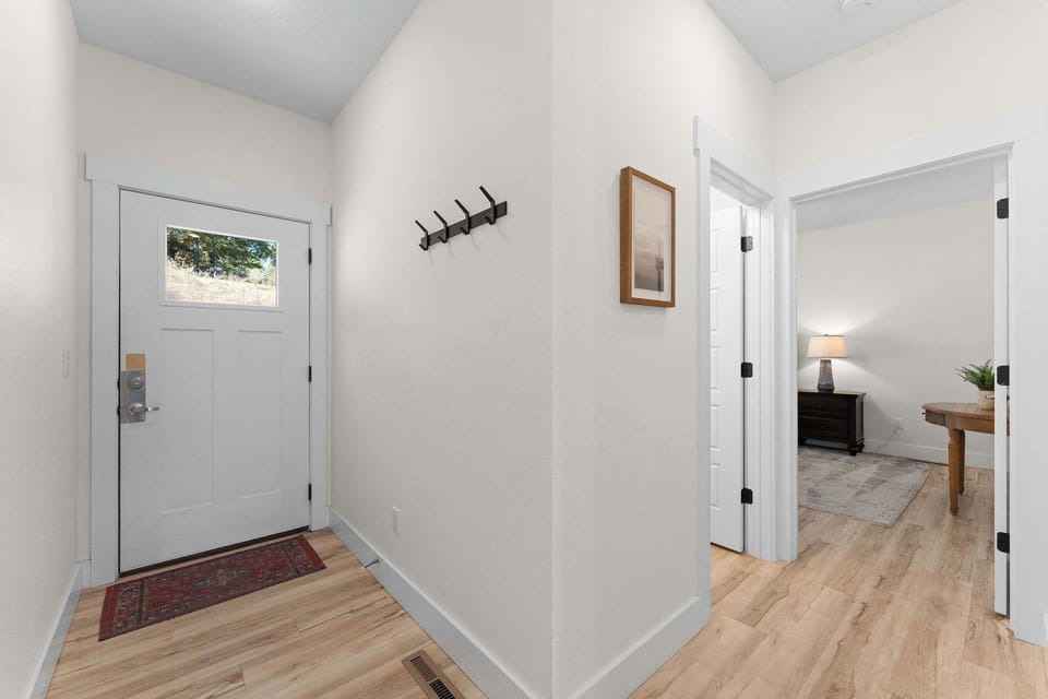 The main entryway has hooks for your jackets and bags!