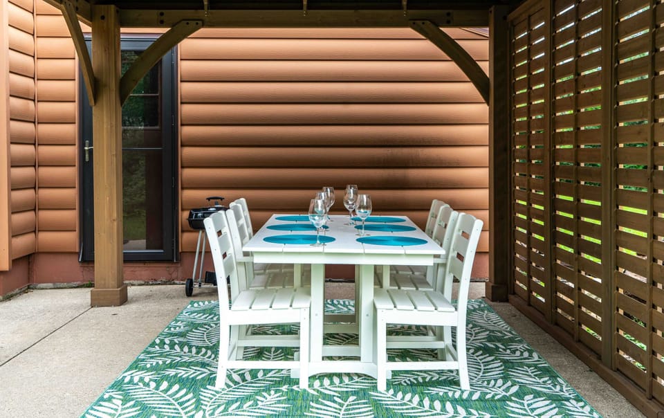 Dine alfresco or enjoy a round of cards under the patio gazebo