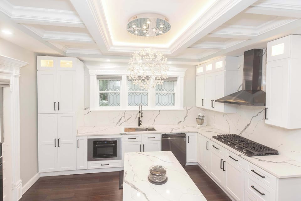 The main house’s kitchen offers ample space & all the comforts of home