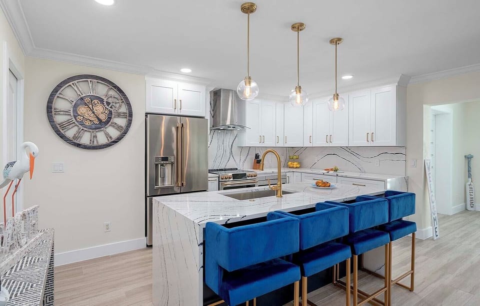 Center Island is Great for Entertainment and Has an Unobstructed View of the Living Room