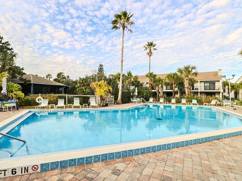 Resort Pool + Relaxing Lounge Area