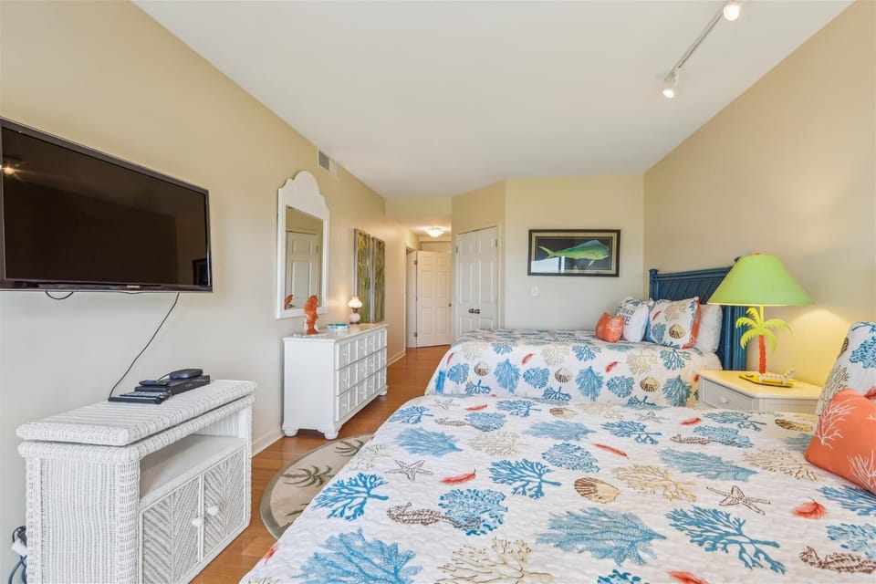 Guest Bedroom with Two Queen Beds at 1831 Beachside Tennis