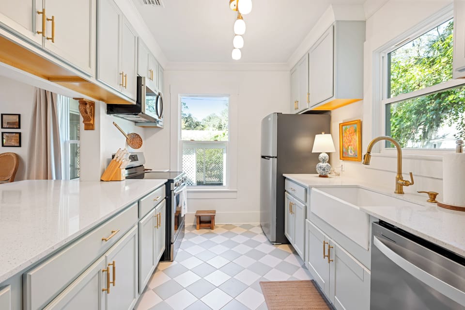 Full kitchen view, step stool for convenience of hard to reach spaces. 