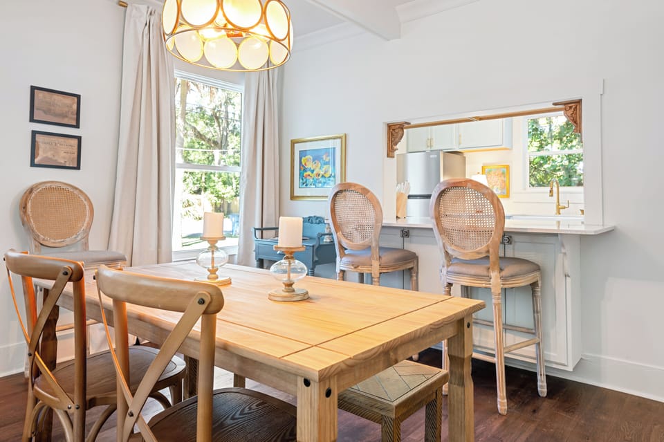 Dining room table, seating for 4 and bar top seating to accommodate 3. 