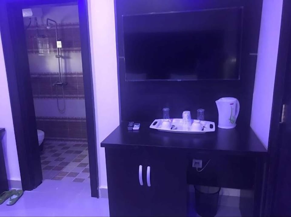 Comfort Room, Balcony, City View | Desk, laptop workspace, free WiFi