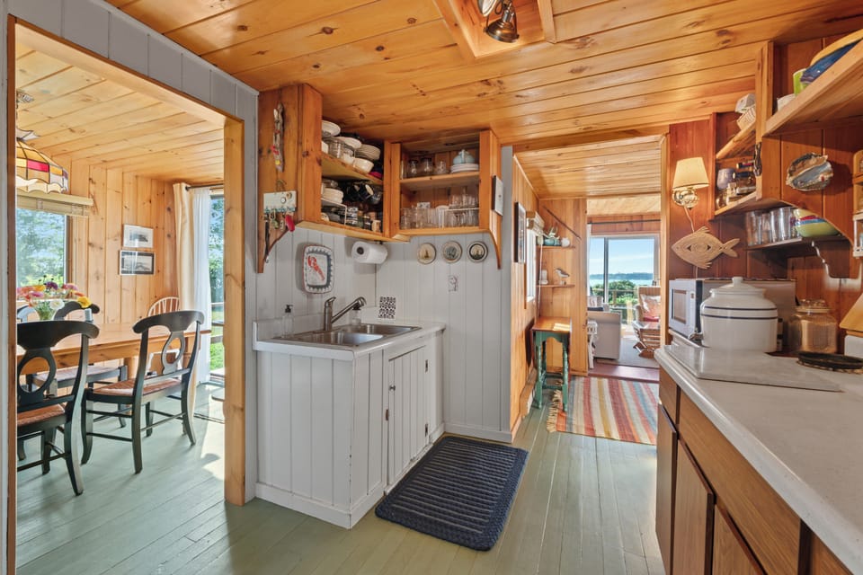 kitchen from entry, dining room on left and living room straight ahead