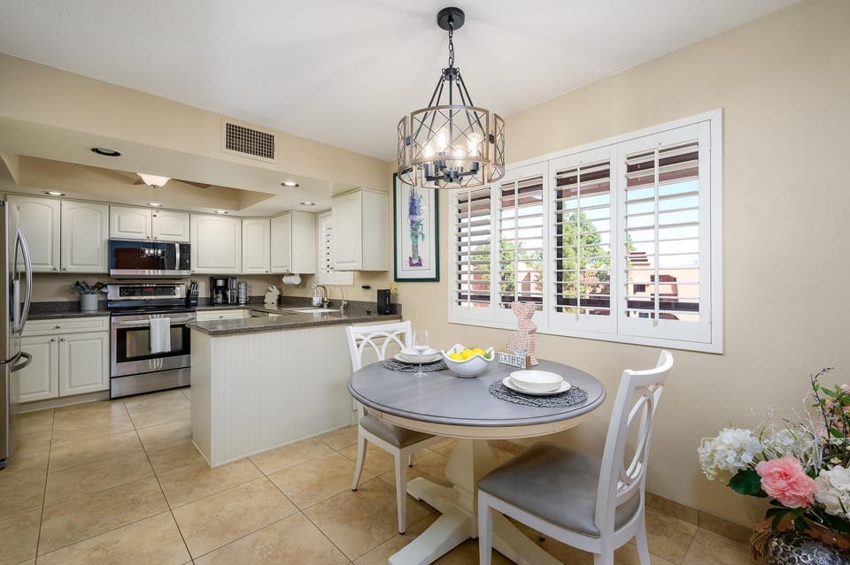 Dining table enlarges when leaf installed.