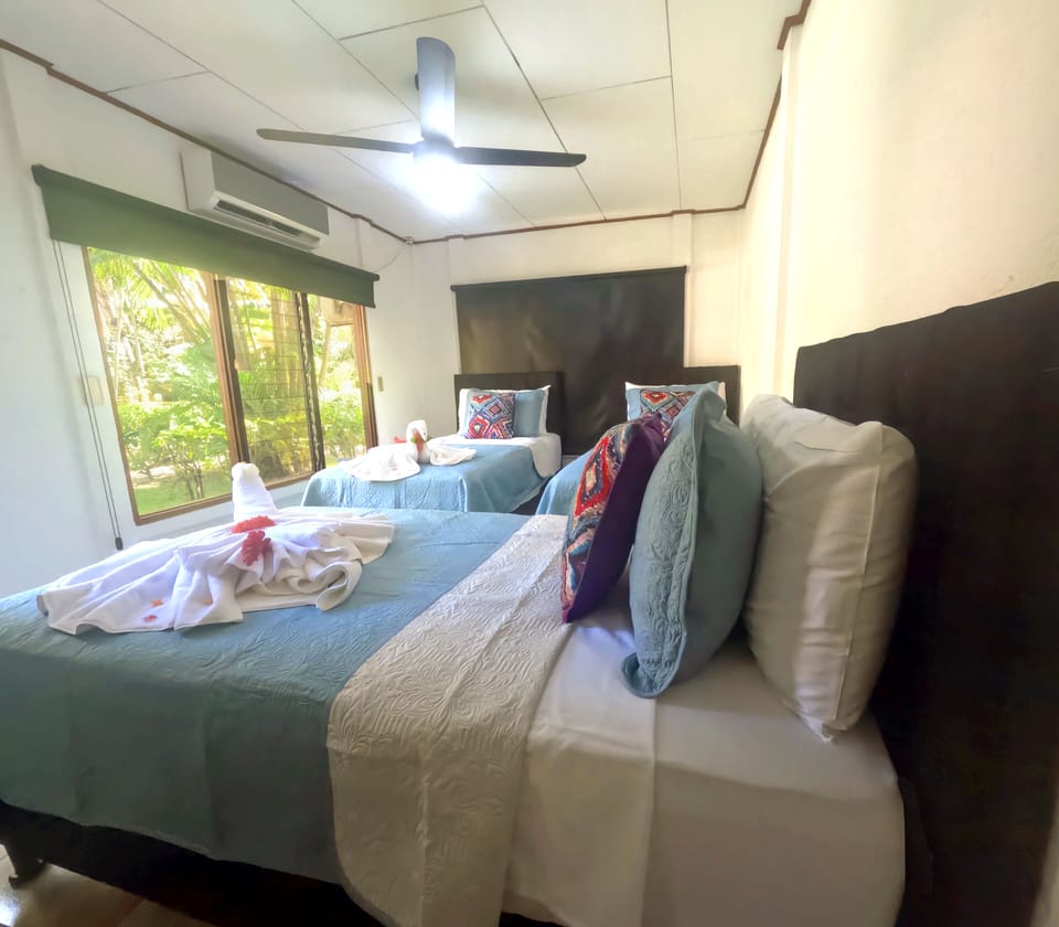 Economy Triple Room | Premium bedding, in-room safe, WiFi (free), bed sheets
