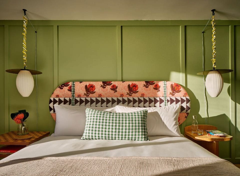 Soft, earthy tones and playful patterns create a welcoming atmosphere, ideal for unwinding after a long day of exploring.
