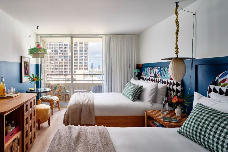 A bright and airy space, where soft sunlight and vibrant accents create a relaxing ambiance, perfect for a rejuvenating stay.