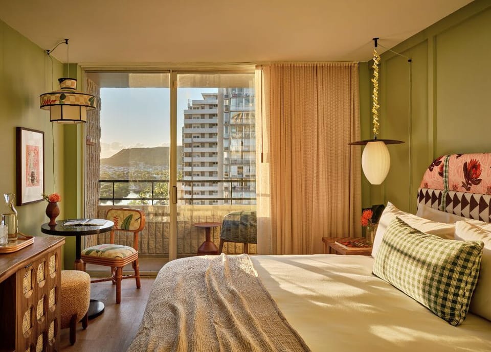 This sunlit room offers a perfect blend of comfort and style, with warm tones and natural light creating an inviting atmosphere for rest and relaxation.