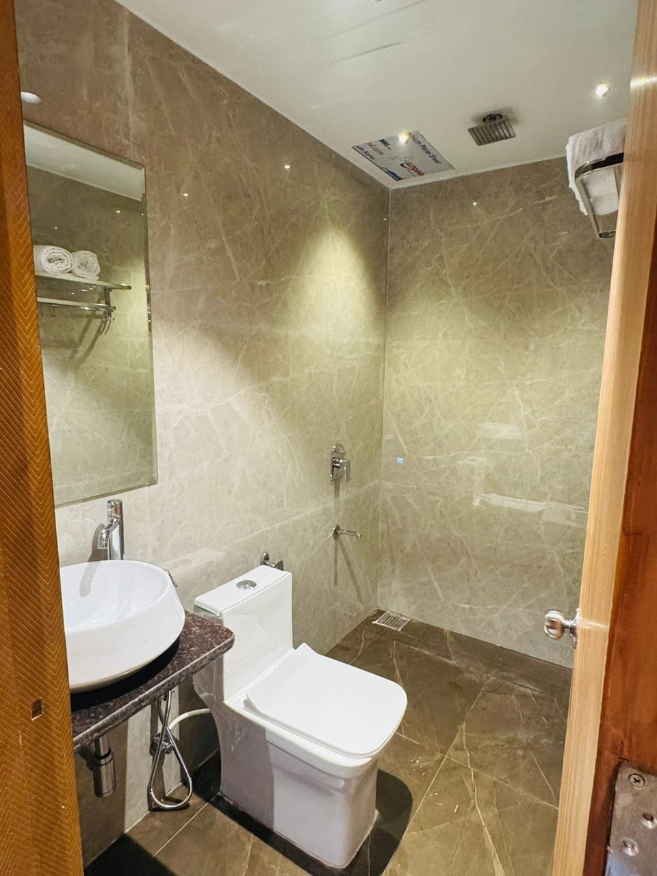 Shower, free toiletries, towels, toilet paper