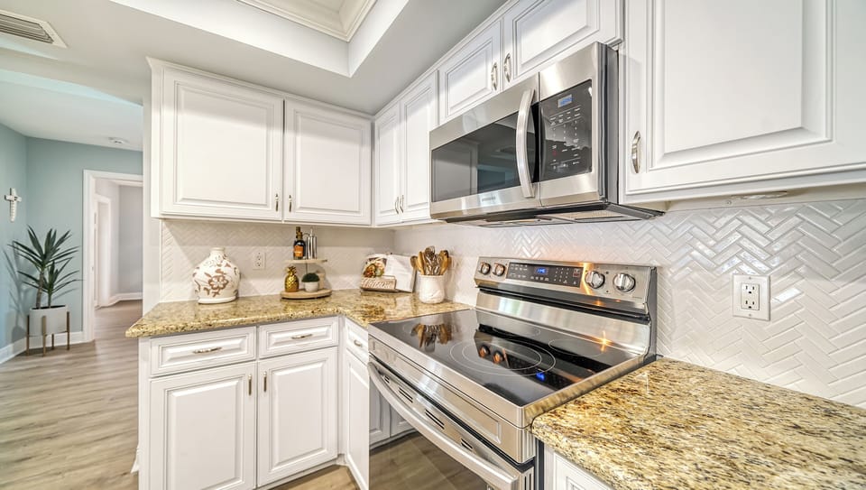 Kitchen range and microwave.