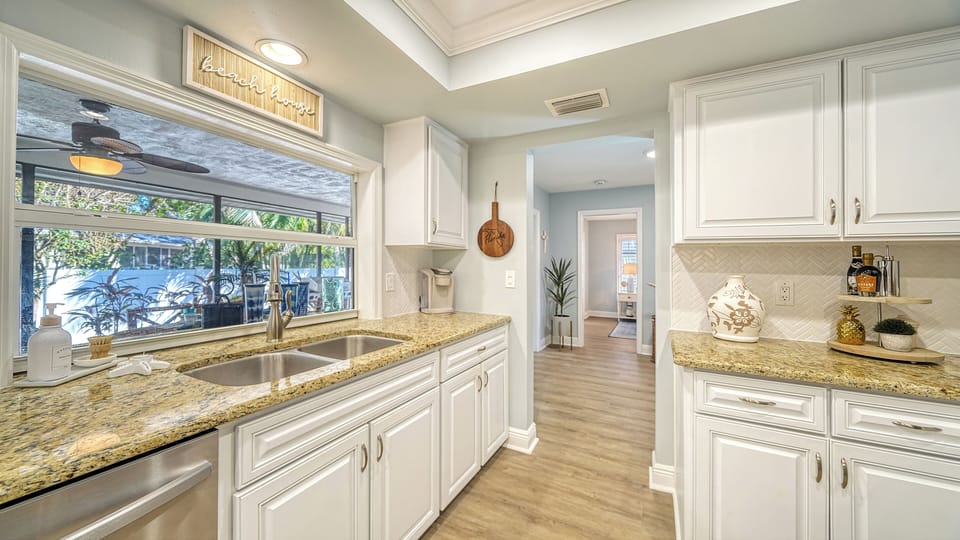 Kitchen with double Stainless Steel sink.