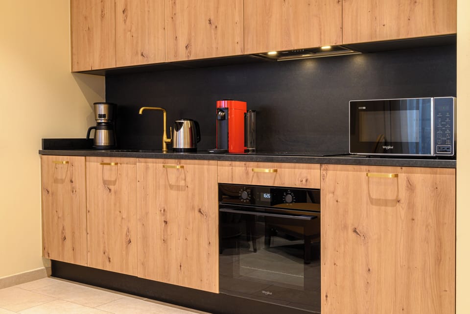 Apartment with Courtyard View | Private kitchen | Espresso maker, coffee/tea maker, fridge, microwave