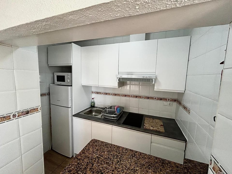 Fridge, microwave, stovetop, electric kettle