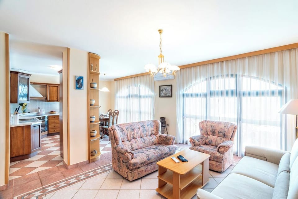 Classic Apartment, 2 Bedrooms, Sea View, Beachfront | Living area | Flat-screen TV