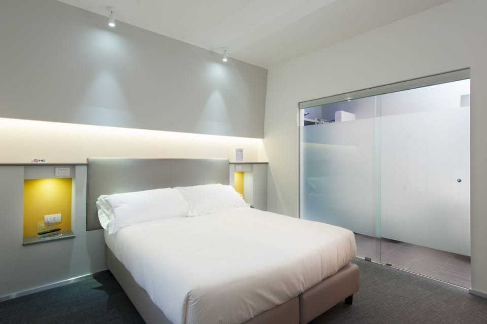 Double or Twin Room | Down comforters, minibar, in-room safe, desk