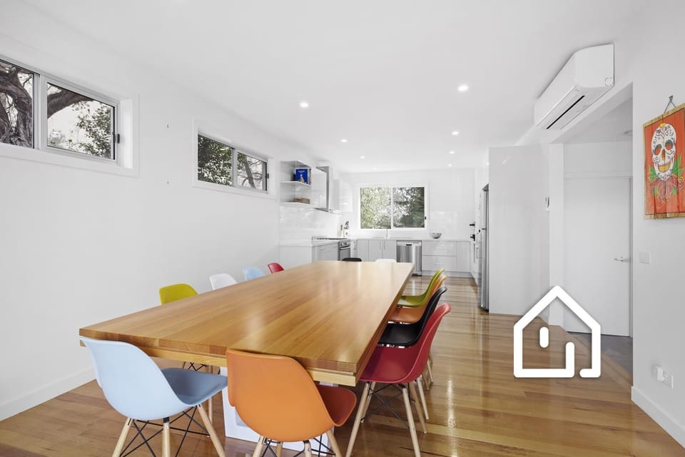 Downstairs open plan living; kitchen and dining with indoor dining for 12