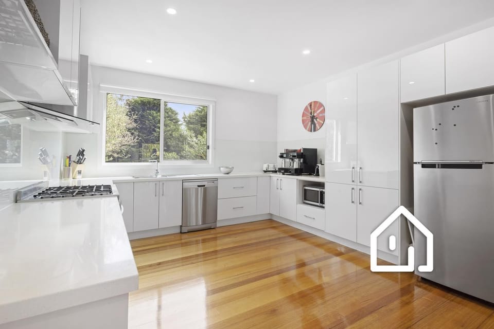Well-appointed modern kitchen with Nespresso coffee pod machine
