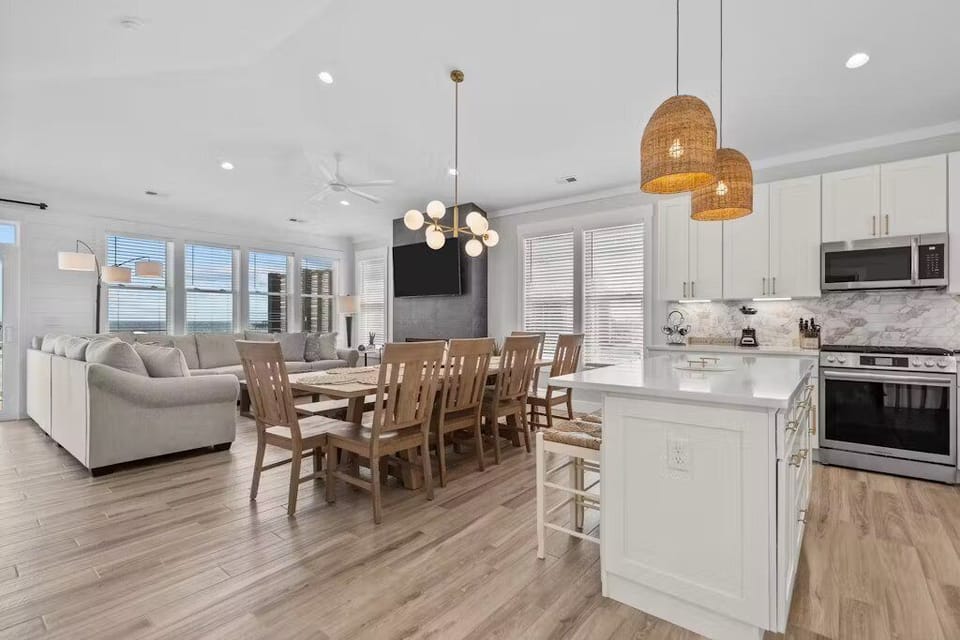 View of kitchen, living and dining areas
