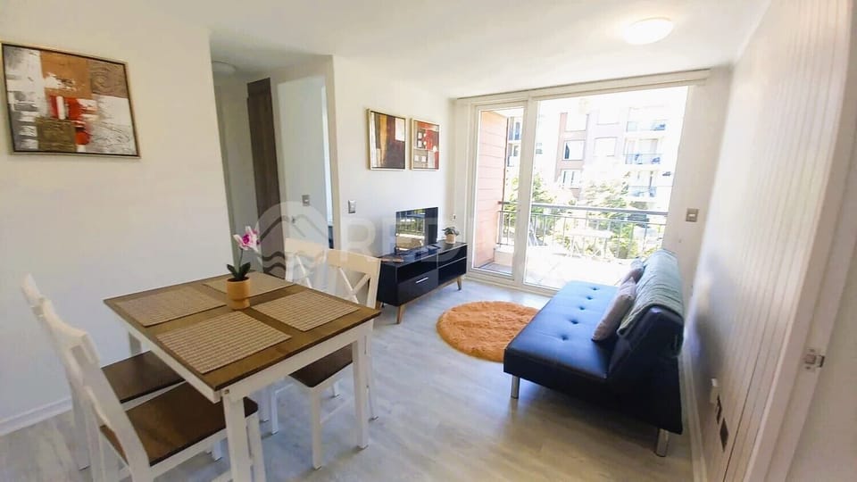 Comfort Apartment | Living area | 32-inch flat-screen TV with digital channels