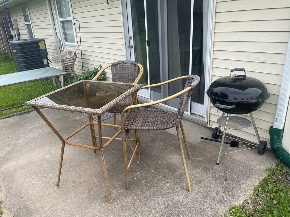 Back patio seating w/ Weber grill