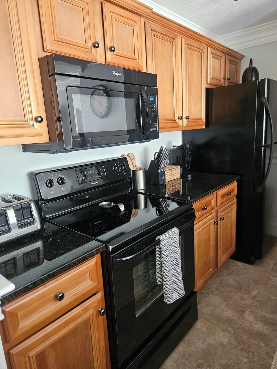 kitchen has ceramic set cookware, keurig pods, basic pantry essentials, toaster