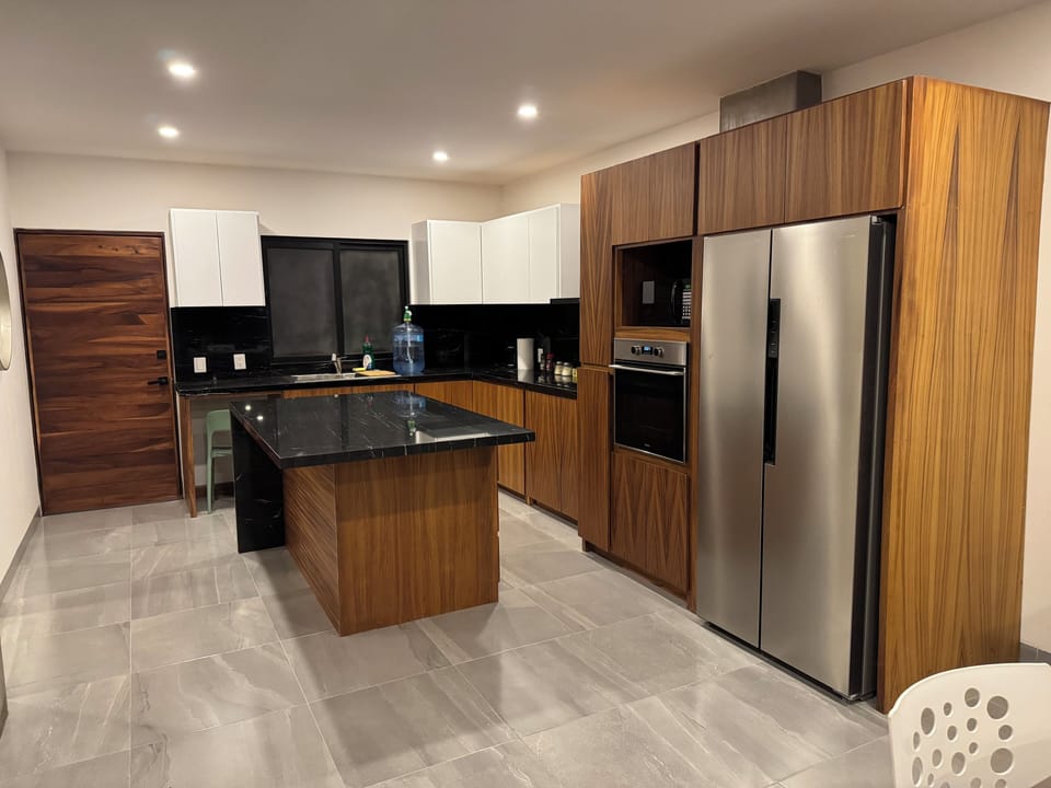 Deluxe Condo, Sea View | Private kitchen | Full-size fridge, microwave, oven, cookware/dishes/utensils