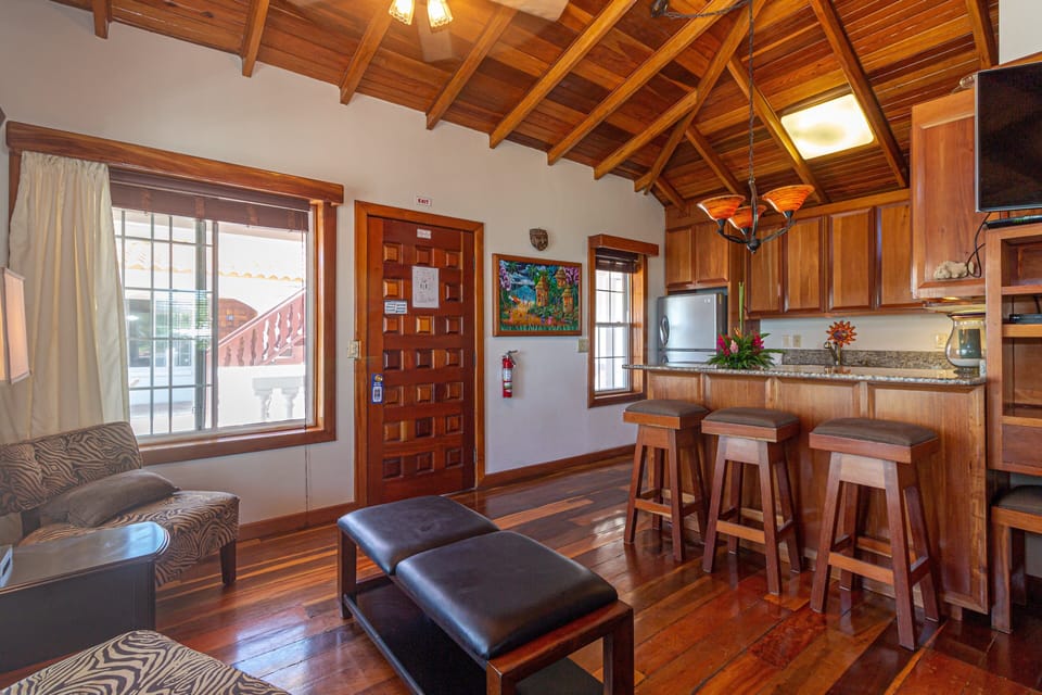 Panoramic Studio Suite, 1 King Bed, Balcony, Ocean View | Living area | 32-inch flat-screen TV with cable channels, TV