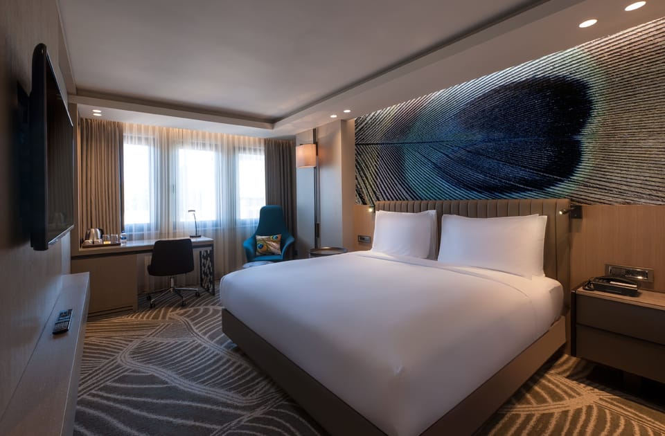 Premium bedding, down comforters, Select Comfort beds, minibar