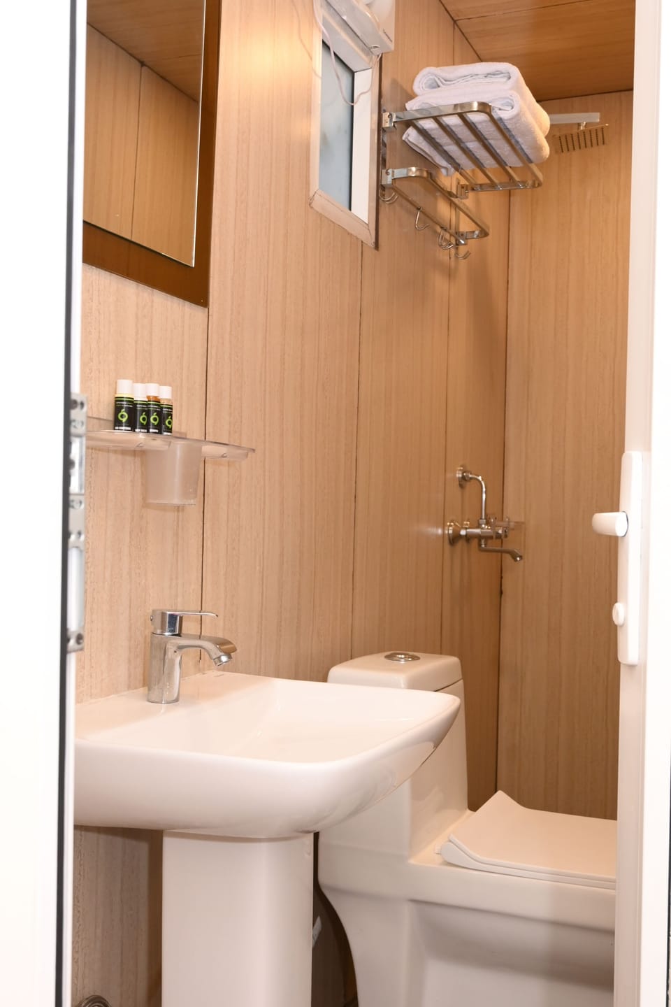 Shower, slippers, towels, soap