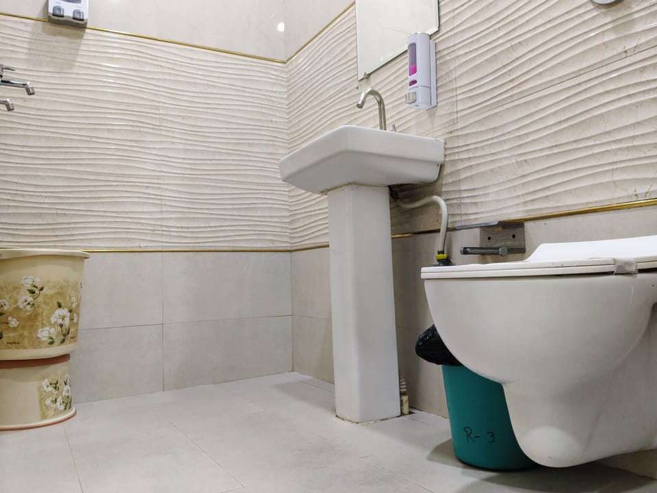 Shower, slippers, towels, soap