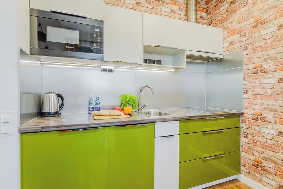 Classic Apartment, Lanai, City View | Private kitchen | Microwave, dishwasher, electric kettle, griddle