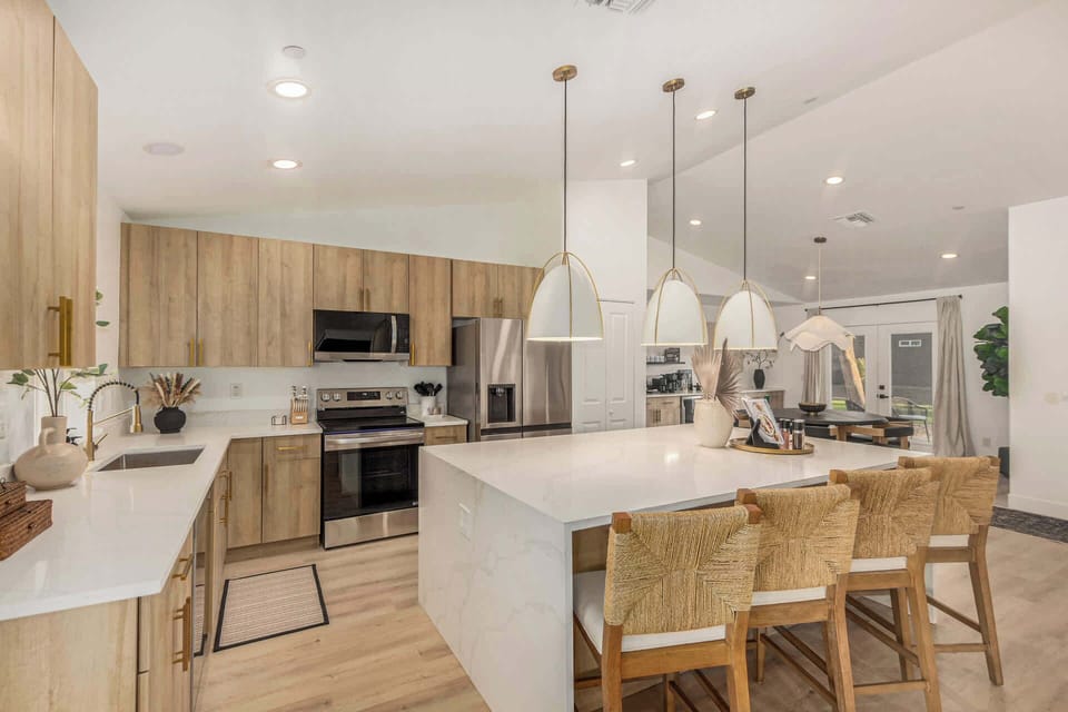 Bright and open with custom cabinets and large kitchen island