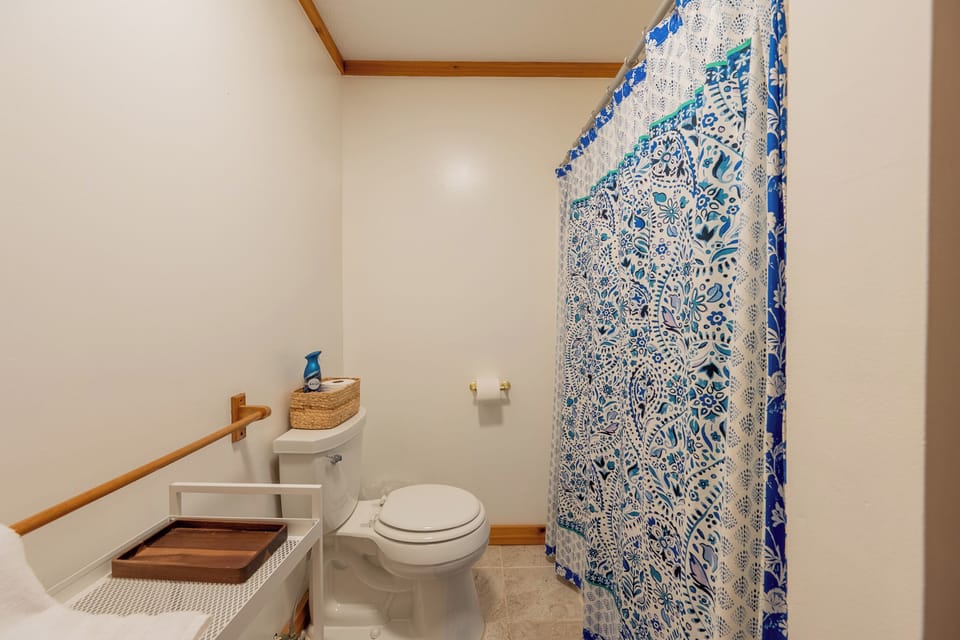 Hallway, full bathroom on main level.