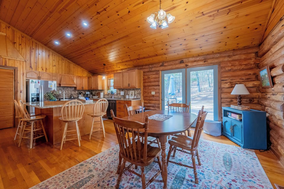 4 person dining room table beside kitchen.