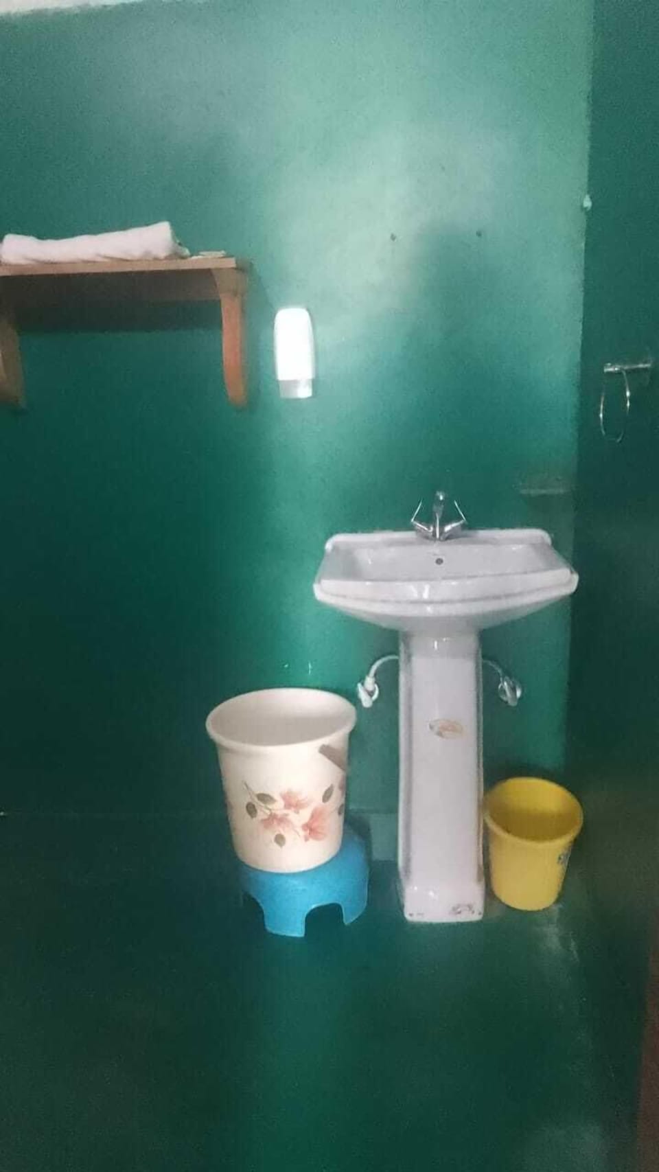 Shower, rainfall showerhead, slippers, towels