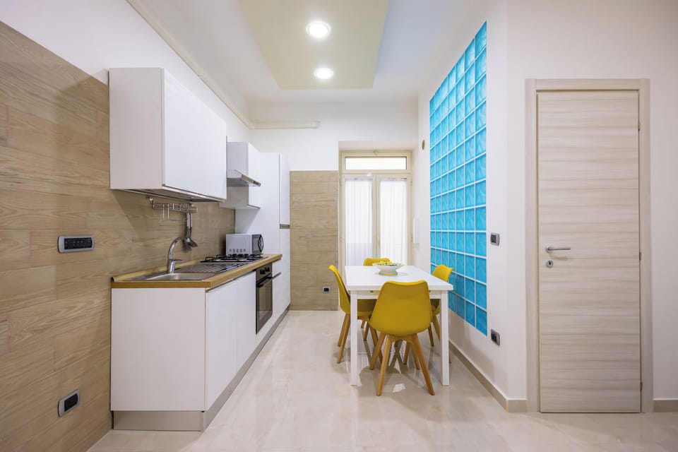 Luxury Apartment, City View | Living area | 55-inch LED TV with digital channels