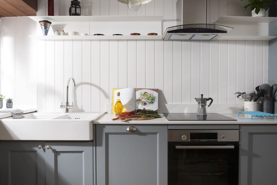 The kitchen with an oven, hob and sink - No.1 St Eia