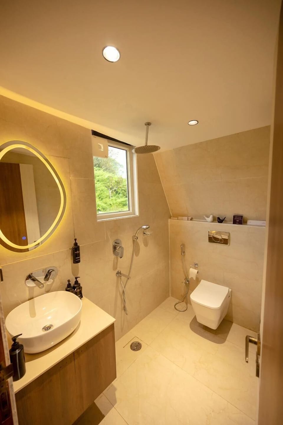 Hydromassage showerhead, designer toiletries, hair dryer, bathrobes