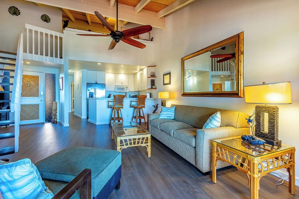 You'll love the open, airy feel with soaring ceilings and coastal-inspired decor inviting you to unwind.