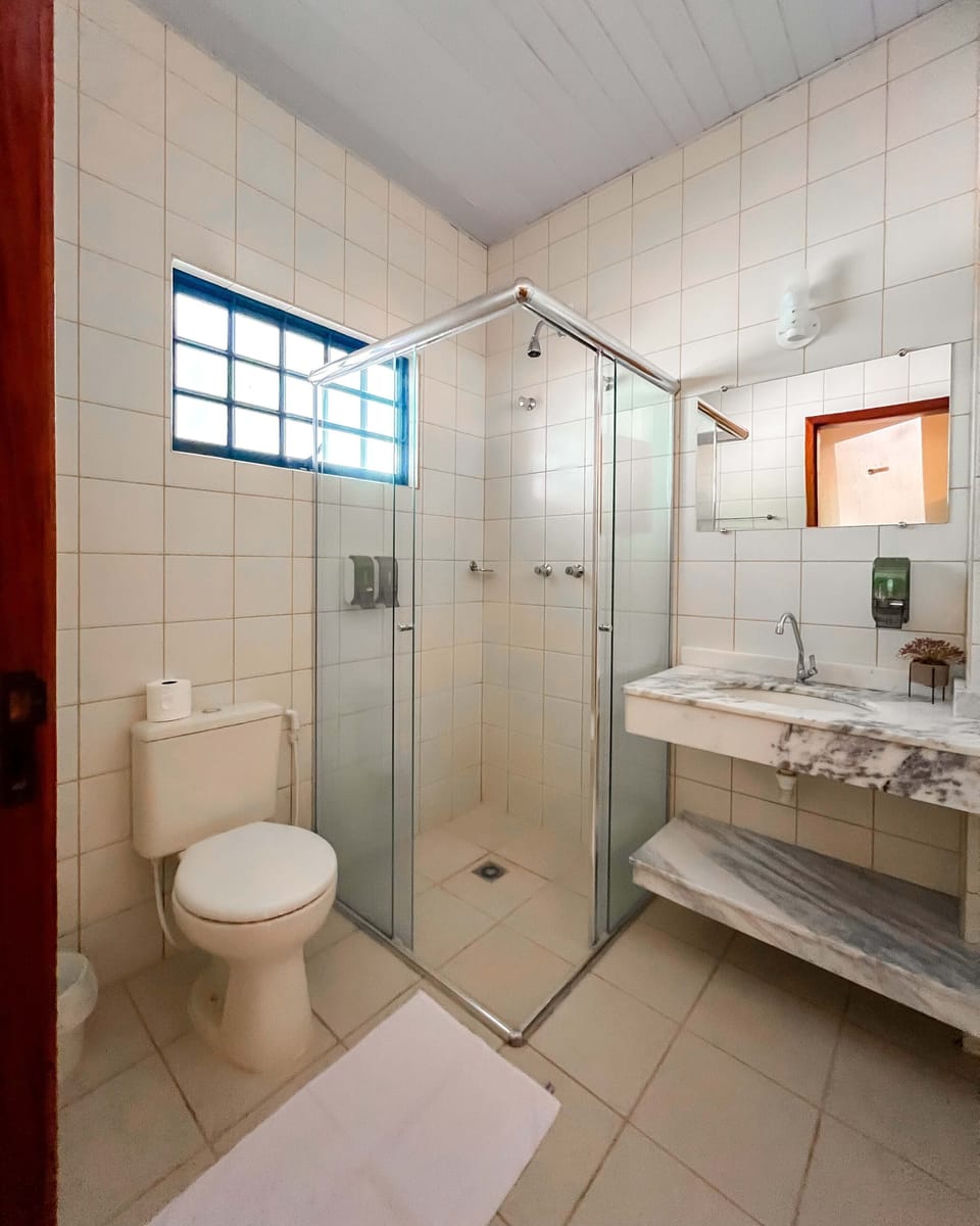 Comfort Double or Twin Room | Bathroom | Shower, towels, soap, shampoo
