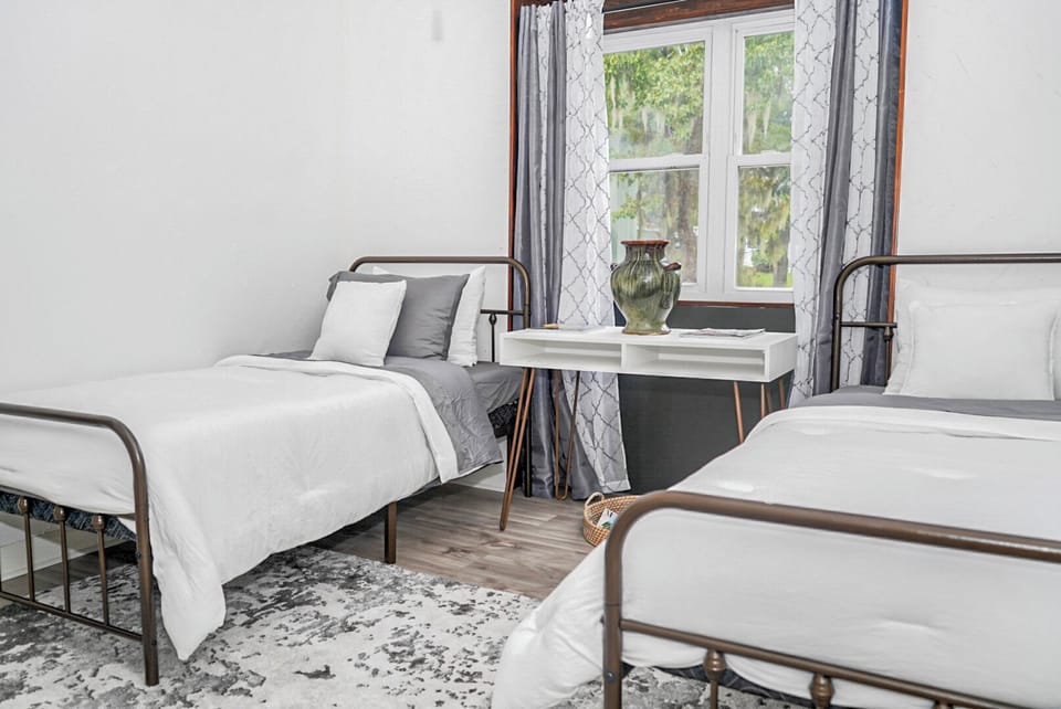 Cozy up with the second bedroom, featuring 2 comfy twin beds