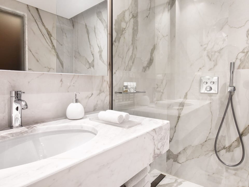 Combined shower/tub, free toiletries, hair dryer, bathrobes