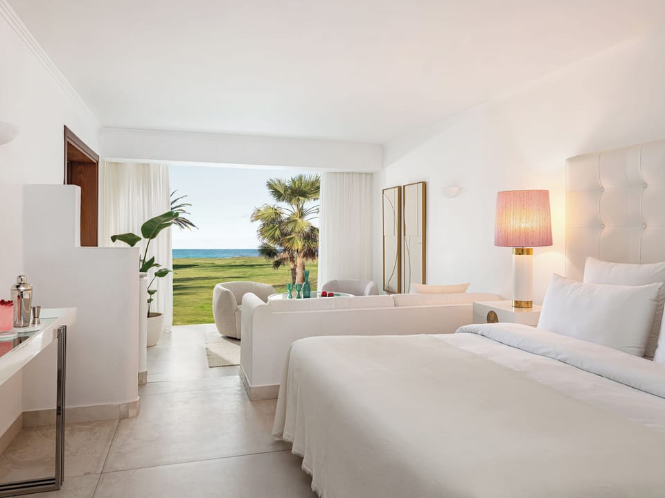 Palace Family Bungalow Suite, Side Sea View | Minibar, in-room safe, blackout drapes, iron/ironing board
