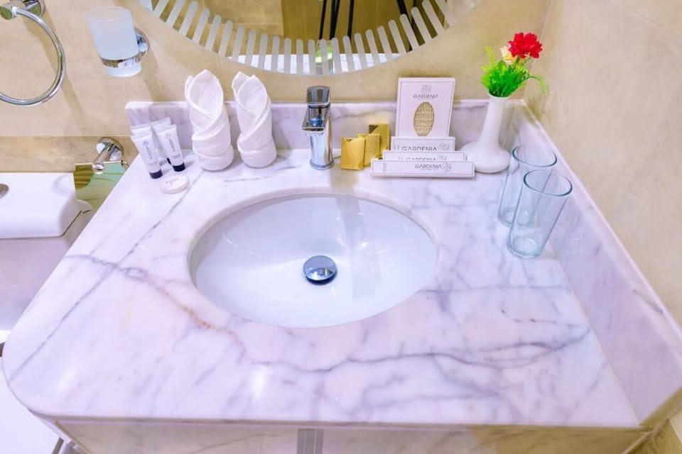 Shower, free toiletries, hair dryer, slippers