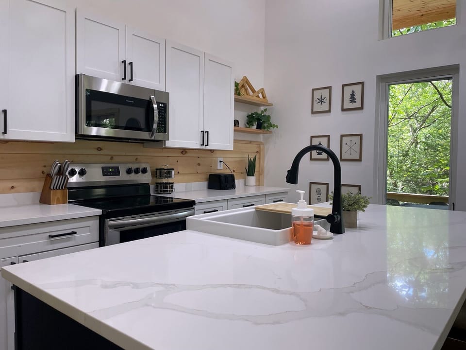 Our kitchen has what you need with a beautiful farm sink
