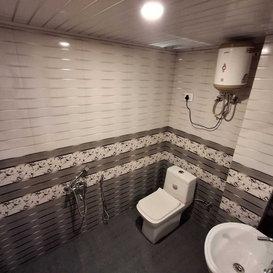 Family Twin Room, Mountain View | Bathroom | Shower, towels, soap, shampoo